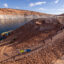 Kayakers descend a trail from a boat ramp at Antelope Point that now ends hundreds of feet from Lake Powell on Aug. 20 near Page, Ariz. Credit: David McNew/Getty Images