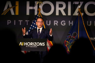 Pennsylvania Gov. Josh Shapiro delivers a keynote speech during the AI Horizons Summit on Sept. 17 in Pittsburgh. Credit: Jeff Swensen/Getty Images