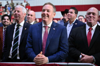 EPA Administrator Lee Zeldin (center) stands with Energy Secretary Chris Wright and White House Border Czar Tom Homan as they listen to President Donald Trump speak at a campaign rally in Syracuse, N.Y., on Oct. 9. Credit: Mandel Ngan/AFP via Getty Images