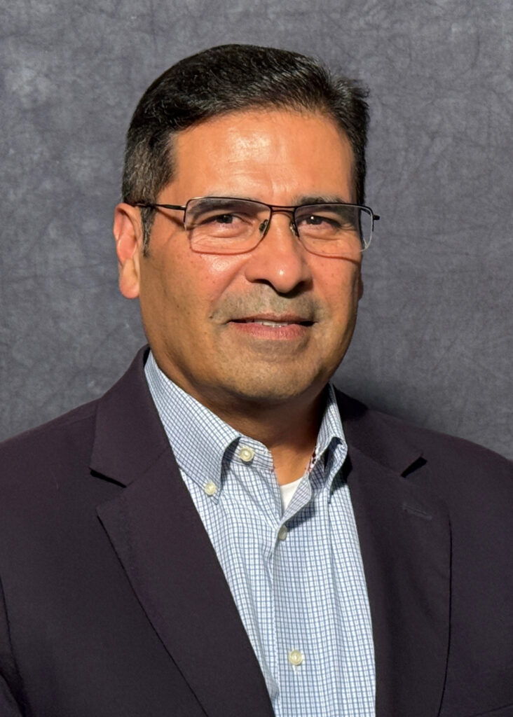 Gil Hernandez, now a candidate for Corpus Christi mayor, poses for a portrait at KEDT-FM studios in September. Credit: Spencer Cihak/KEDT