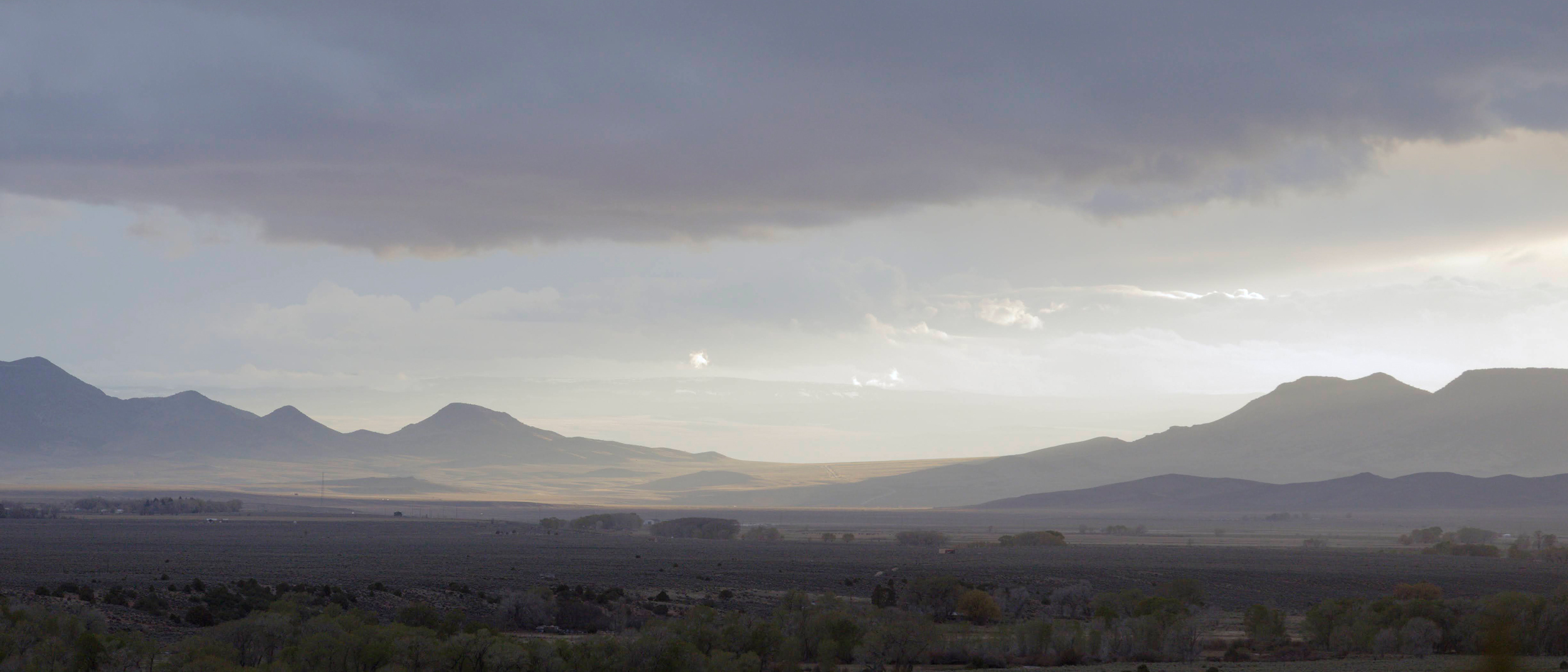 The sun sets over agriculture fields in San Luis, Colo. Credit: Jacob Spetzler/Inside Climate News
