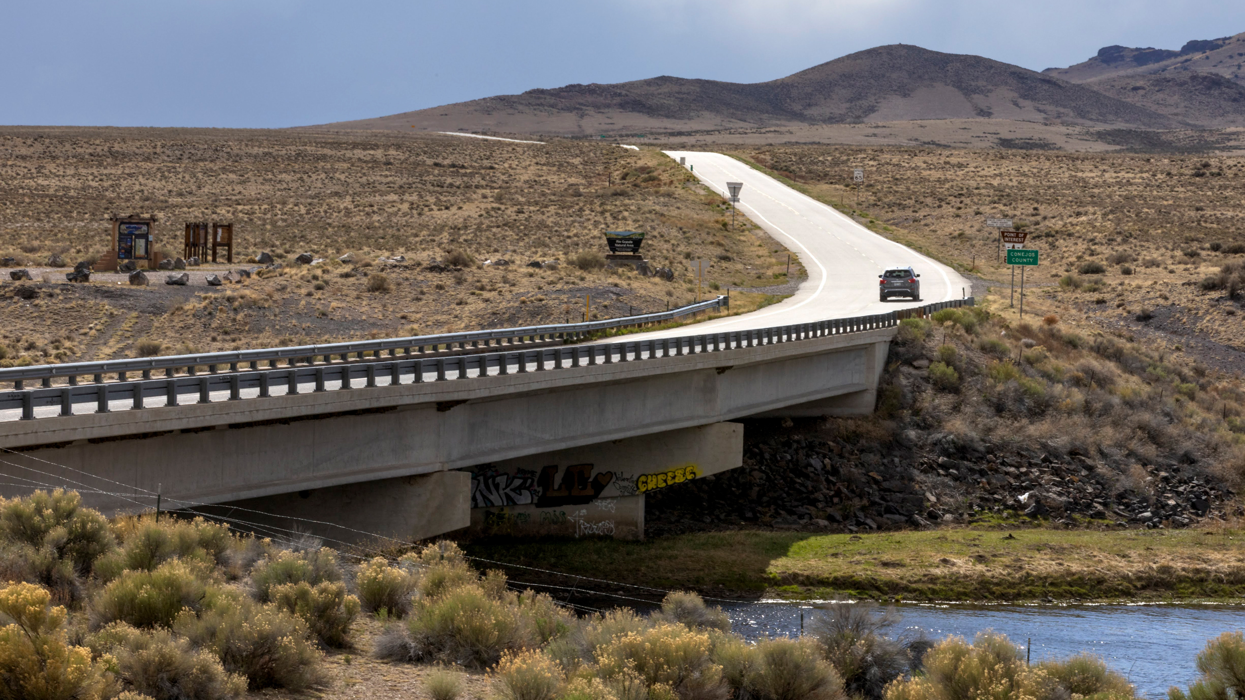 Colorado State Highway 142 runs over the Rio Grande River in the San Luis Valley. Credit: Jacob Spetzler/Inside Climate News