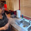 Ann Jones says the water at her home in Whitted, Fla., runs clear only some of the time. Other times, the water is brown. Credit: Amy Green/Inside Climate News