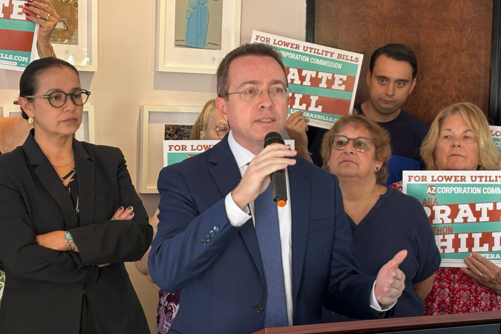 Democrat Jonathon Hill, candidate for the Arizona Corporation Commission, speaks at a press conference calling on the commission to launch an investigation into how data centers are increasing utility bills for Arizona Power Service customers. Credit: Wyatt Myskow/Inside Climate News