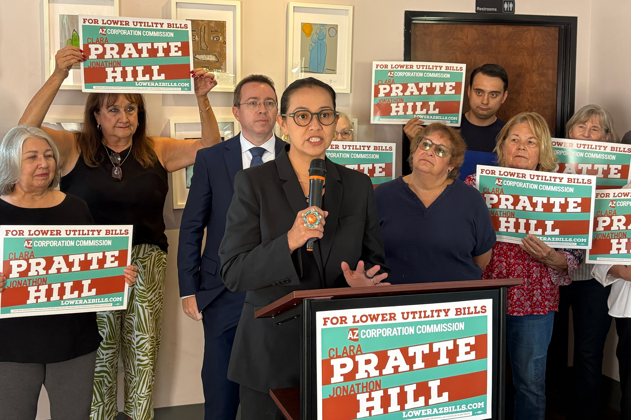 Democrat Clara Pratte, candidate for the Arizona Corporation Commission, speaks at a press conference calling on the commission to launch an investigation into how data centers are increasing utility bills for Arizona Power Service customers. Credit: Wyatt Myskow/Inside Climate News