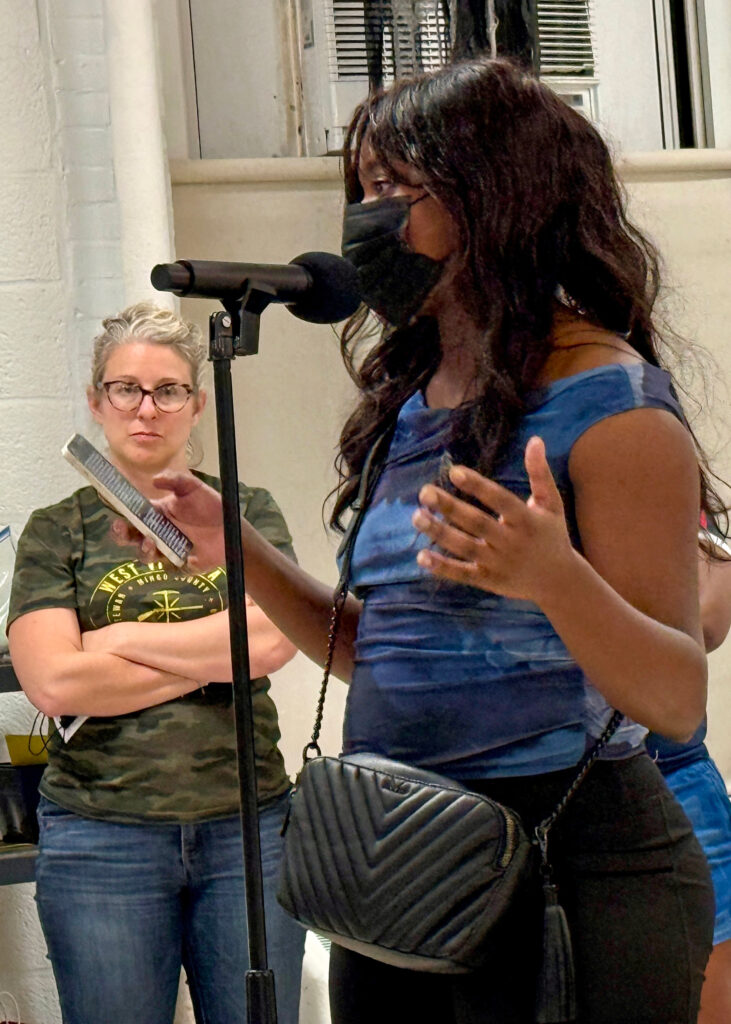 Shashawnda Campbell of the South Baltimore Community Land Trust addresses Maryland regulators during the Oct. 1 public hearing on WIN Waste’s permit renewals in Curtis Bay. Credit: Aman Azhar/Inside Climate News