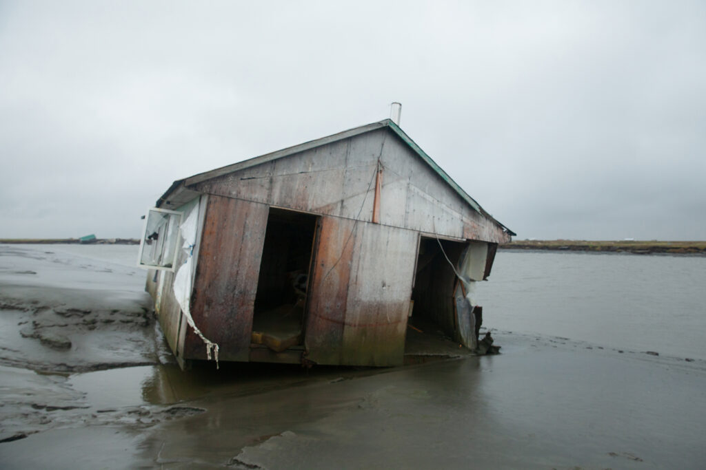 One of 46 houses that floated for miles, with families trapped inside, on the night of Typhoon Halong. A family of three died in it. One body is still missing. Credit: Olga Loginova/Inside Climate News