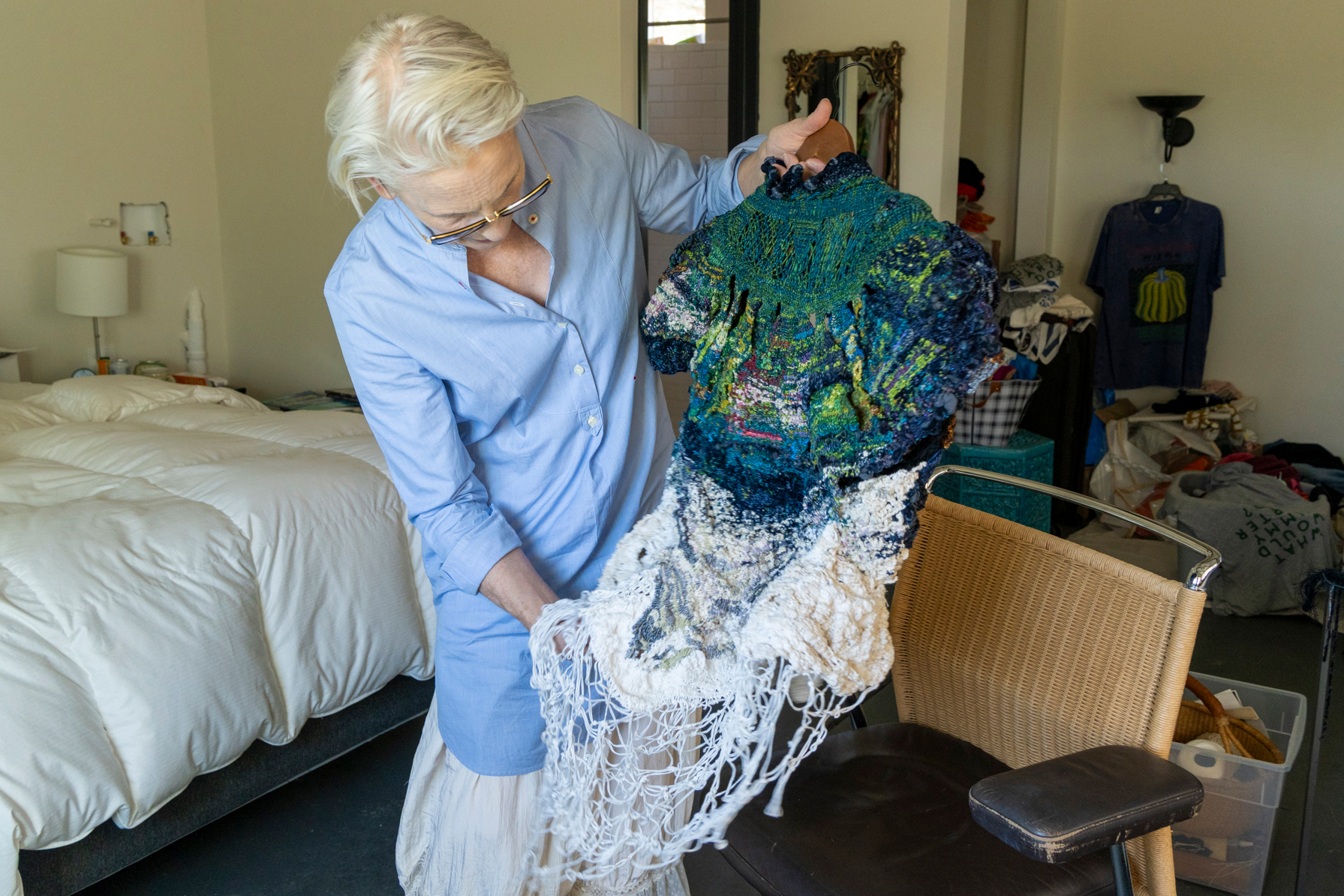 Maryrose Smyth displays a completed piece of knotwork she saved from the Eaton fire. Credit: Nina Dietz/Inside Climate News