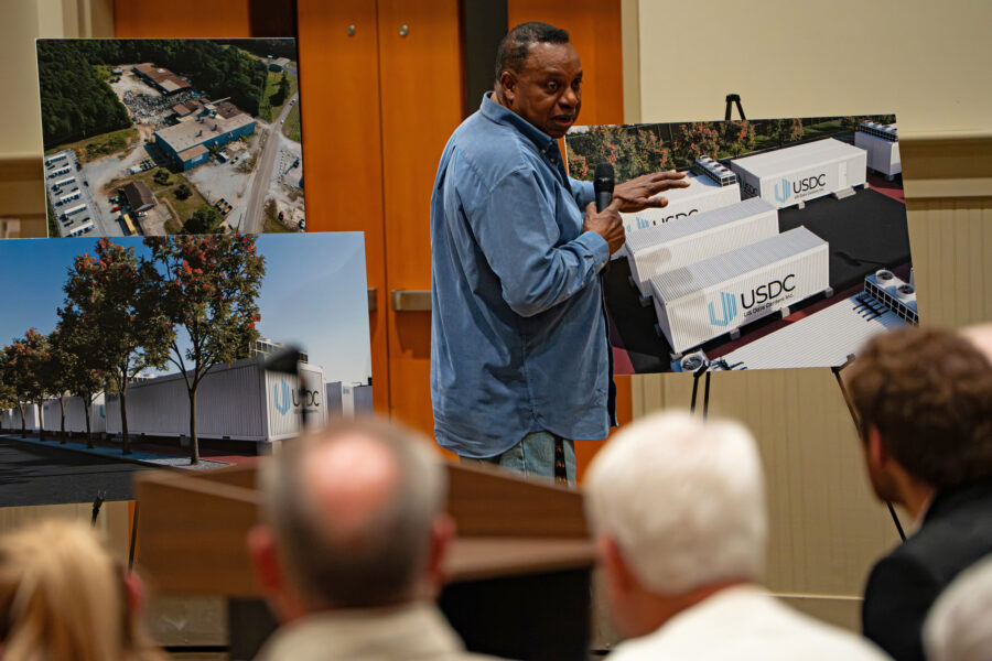 Errol Peart with DigiPowerX speaks with community members about the company's data center expansion project in Columbiana, Ala., in January. Credit: Lee Hedgepeth/Inside Climate News
