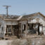 A dilapidated house stands in Calipatria, Calif., a small Imperial Valley community near the Salton Sea. The lithium boom is arriving in a region where residents already face deep economic disparities and longstanding infrastructure challenges. Credit: Carla Samon Ros/CJI