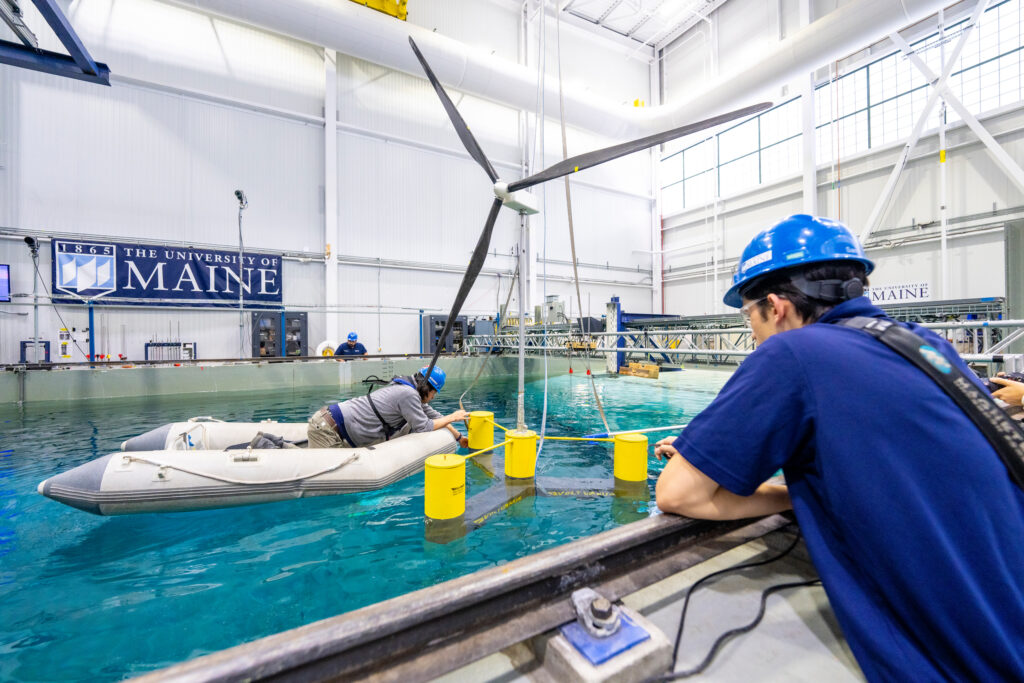Staff and students test the wind/wave facility at the Advanced Structures and Composites Center. Credit: University of Maine