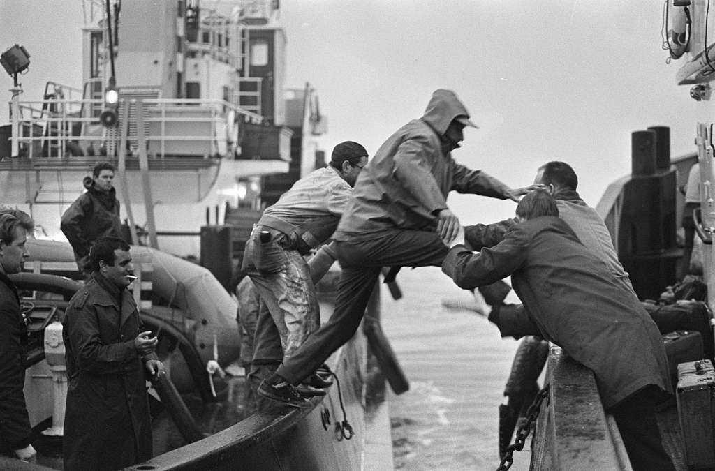 A crew abandons ship as the SS South America burns in Rotterdam in 1966. Credit: Sepia Times, NY Daily News, Evers, Joost/Anefo
