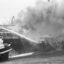A fire rages on the SS South America, one of at least 90 fires that broke out on ships carrying fishmeal between the 1950s and 1970s. In an effort to prevent more fishmeal fires on cargo ships, the feed industry began treating fishmeal with ethoxyquin. Credit: Sepia Times, NY Daily News, Evers, Joost/Anefo