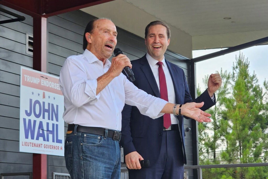 John Wahl (right) appears onstage with singer Lee Greenwood. Credit: Courtesy photo